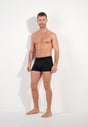 Full-body view of a men model wearing HO black/black print cotton Boxer Briefs HO1 2p