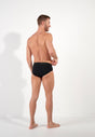 General view of a men model wearing HO black/black print cotton Mini Briefs HO1 2p