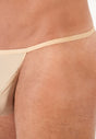 Close-up view of a men model wearing HO skin  G-String