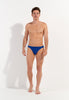Full-body view of a men model wearing HO blue  Micro Briefs