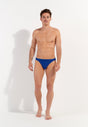 Full-body view of a men model wearing HO blue  Micro Briefs