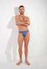Full-body view of a men model wearing HO midblue  Micro Briefs