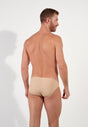 Back view of a men model wearing HO skin  Micro Briefs