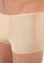 Close-up view of a men model wearing HO skin  Trunk