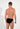 Back view of a men model wearing HO black cotton Comfort Micro Briefs