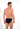 Back view of a men model wearing HO navy cotton Comfort Micro Briefs