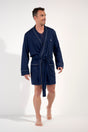 General view of a men model wearing HO navy cotton Robe