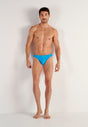 Full-body view of a men model wearing HO turquoise  Swim Micro Briefs