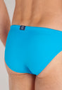 Close-up view of a men model wearing HO turquoise  Swim Micro Briefs