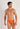 Front view of a men model wearing HO orange  Swim Micro Briefs