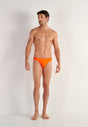 Full-body view of a men model wearing HO orange  Swim Micro Briefs
