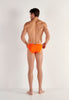 General view of a men model wearing HO orange  Swim Micro Briefs