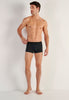 Full-body view of a men model wearing HO black modal/viscose/tencel Boxer Briefs HO1