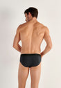 Back view of a men model wearing HO black modal/viscose/tencel Briefs HO1
