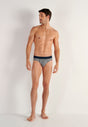 Full-body view of a men model wearing HO navy modal/viscose/tencel Briefs HO1
