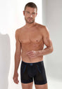 Front view of a men model wearing HO black  Boxer Briefs
