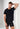 Front view of a men model wearing HO black  Tee-Shirt Crew Neck