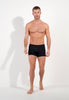 Full-body view of a men model wearing HO black  Boxer Briefs