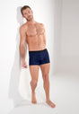 Full-body view of a men model wearing HO navy  Boxer Briefs