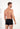 Back view of a men model wearing HO black cotton Comfort Boxer Briefs