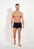 Full-body view of a men model wearing HO black cotton Comfort Boxer Briefs