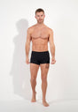 Full-body view of a men model wearing HO black cotton Comfort Boxer Briefs