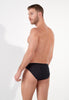 Back view of a men model wearing HO black cotton Comfort Micro Briefs
