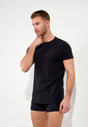 Front view of a men model wearing HO black cotton Tee-Shirt Crew Neck