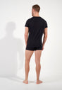 General view of a men model wearing HO black cotton Tee-Shirt Crew Neck