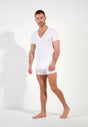 Full-body view of a men model wearing HO white cotton Tee-Shirt V Neck