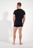General view of a men model wearing HO black cotton Tee-Shirt V Neck