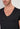 Close-up view of a men model wearing HO black cotton Tee-Shirt V Neck