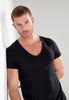 General view of a men model wearing HO black cotton Tee-Shirt V Neck
