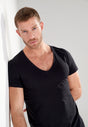 General view of a men model wearing HO black cotton Tee-Shirt V Neck