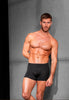 Full-body view of a men model wearing HO black modal/viscose/tencel Comfort Boxer Briefs HO1