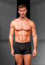 Full-body view of a men model wearing HO black modal/viscose/tencel Comfort Boxer Briefs