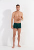 Full-body view of a men model wearing HO dark green modal/viscose/tencel Comfort Boxer Briefs