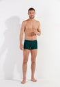 Full-body view of a men model wearing HO dark green modal/viscose/tencel Comfort Boxer Briefs