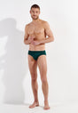 Full-body view of a men model wearing HO dark green modal/viscose/tencel Comfort Briefs HO1