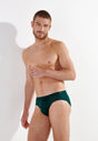 Front view of a men model wearing HO dark green modal/viscose/tencel Comfort Briefs