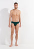 Full-body view of a men model wearing HO dark green modal/viscose/tencel Comfort Briefs