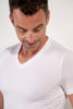 Close-up view of a men model wearing HO white modal/viscose/tencel Tee-Shirt V Neck