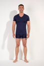 Full-body view of a men model wearing HO navy modal/viscose/tencel Tee-Shirt V Neck