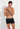 General view of a men model wearing HO black/black/black cotton Boxer Briefs HO1 3p