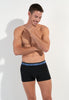 General view of a men model wearing HO black/black/black cotton Boxer Briefs HO1 3p