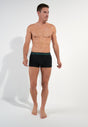 Full-body view of a men model wearing HO black/black/black cotton Boxer Briefs HO1 3p