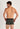 Back view of a men model wearing HO black/black print cotton Boxer Briefs HO1 2p