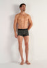 Full-body view of a men model wearing HO black/black print cotton Boxer Briefs HO1 2p