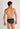 Back view of a men model wearing HO black/black print cotton Mini Briefs HO1 2p